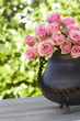 Beautiful roses and a antique vase Beautiful roses and a antique vase