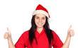 Happy girl with Christmas hat saying Ok