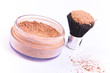 makeup brush and powder