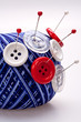 pins in wool ball with buttons pins in wool ball with buttons