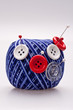 pins in wool ball with buttons pins in wool ball with buttons