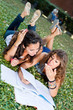 Two Young Woman Study Togheter at Park