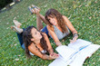 Two Young Woman Study Togheter at Park