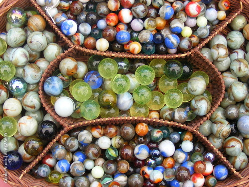 Photo: Marbles in a basket Marbles in a basket