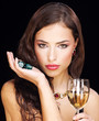 Foto: pretty young woman holding dices on black background pretty young woman holding dices on black background