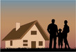 Happy family with a house in the background