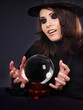 Young woman with crystal ball. Young woman with crystal ball.