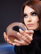 Young woman with crystal ball. Young woman with crystal ball.