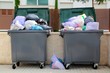 Trash garbage full container in street