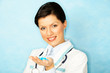 adult caucasian woman as a doctor holding meds