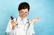 adult caucasian woman as a doctor holding meds