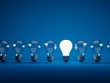 Row of light bulbs on blue background Row of light bulbs on blue background