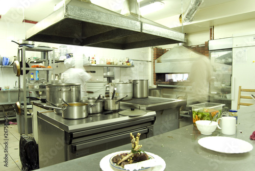 Photo: Kitchen in restaurant or canteen with personnel Kitchen in restaurant or canteen with personnel