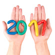 Hands with plasticine figures