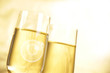 Champagne glasses on golden background