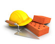 Bricks, trowel and a yellow plastic helmet