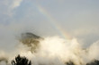 Montagne surplombée par un arc en ciel autour de Cilaos Montagne surplombée par un arc en ciel autour de Cilaos