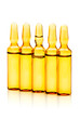 Phials of medication on white background