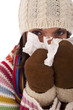 woman sneezing to a tissue woman sneezing to a tissue