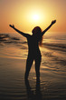 Silhouette of a woman at the sunset Silhouette of a woman at the sunset