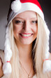 girl in a New Year's cap laughs