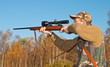 Hunter aiming animals