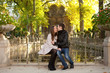 Young beautiful couple in the Luxembourg garden at fall. Paris,