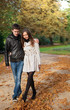 Young beautiful couple in the Luxembourg garden at fall. Paris,