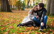 Young beautiful couple in the Luxembourg garden at fall. Paris,