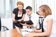 Manager with office workers on meeting