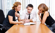Manager with office workers on meeting