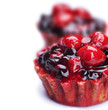 Cake with Berries over white.Healthy dessert