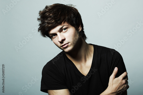 Photo: Fashion portrait of the young beautiful man Fashion portrait of the young beautiful man