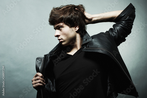 Photo: Fashion portrait of the young beautiful man Fashion portrait of the young beautiful man