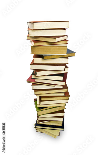 Photo: Pile of books isolated on a white background Pile of books isolated on a white background