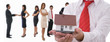 Businesspeople shaking hands and posing with dummy of house