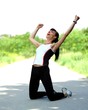 Photo: Portrait of an excited young sportswoman rejoicing winning Portrait of an excited young sportswoman rejoicing winning