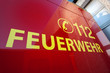 Foto: Feuerwehrfahrzeug mit Aufschrift "112 - Feuerwehr" Feuerwehrfahrzeug mit Aufschrift "112 - Feuerwehr"