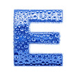 Blue ice alphabet symbol - letter E. Water drops on glossy metal