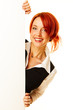 adult girl is holding a blank white billboard