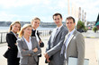 Group of business people standing outside a trade fair