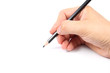 Hand holding a black pencil on white background Hand holding a black pencil on white background