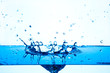 blue water splashing on white background.