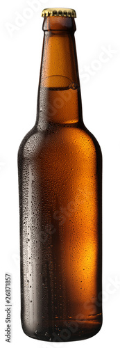 Photo: Bottle of beer with drops on white background. Bottle of beer with drops on white background.