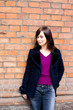 Girl by the wall