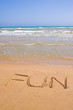 beautiful exotic beach in Mediterranean with a sign