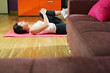 woman doing abs exercise at home