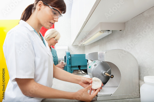 Photo: Dental Assistant with Tooth Impression Dental Assistant with Tooth Impression