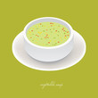 vegetable soup in white bowl with green background vegetable soup in white bowl with green background