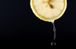 Sliced lemon on black background Sliced lemon on black background